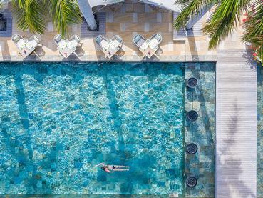 Profitez de la piscine du Four Seasons Resort Mauritius