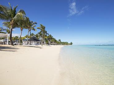 La plage immaculée de l'Heritage Le Telfair Golf & Wellness Resort